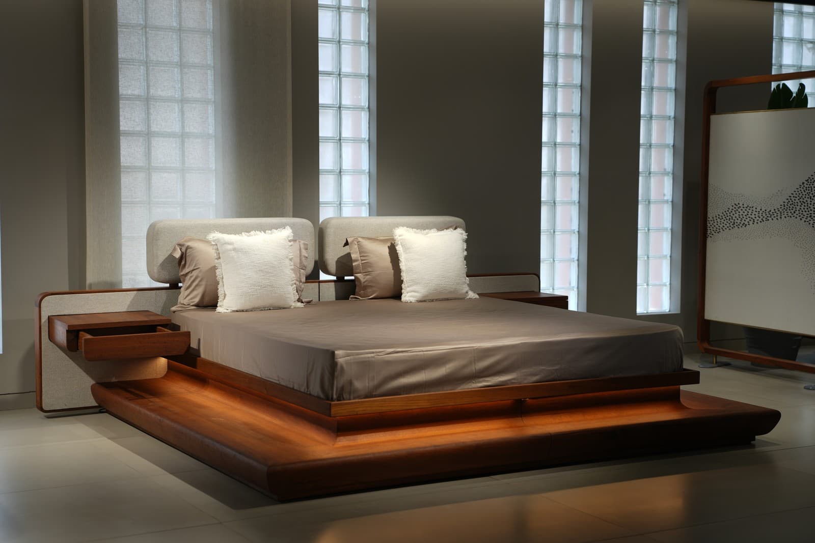 A solid wood platform bed styled by The Decora